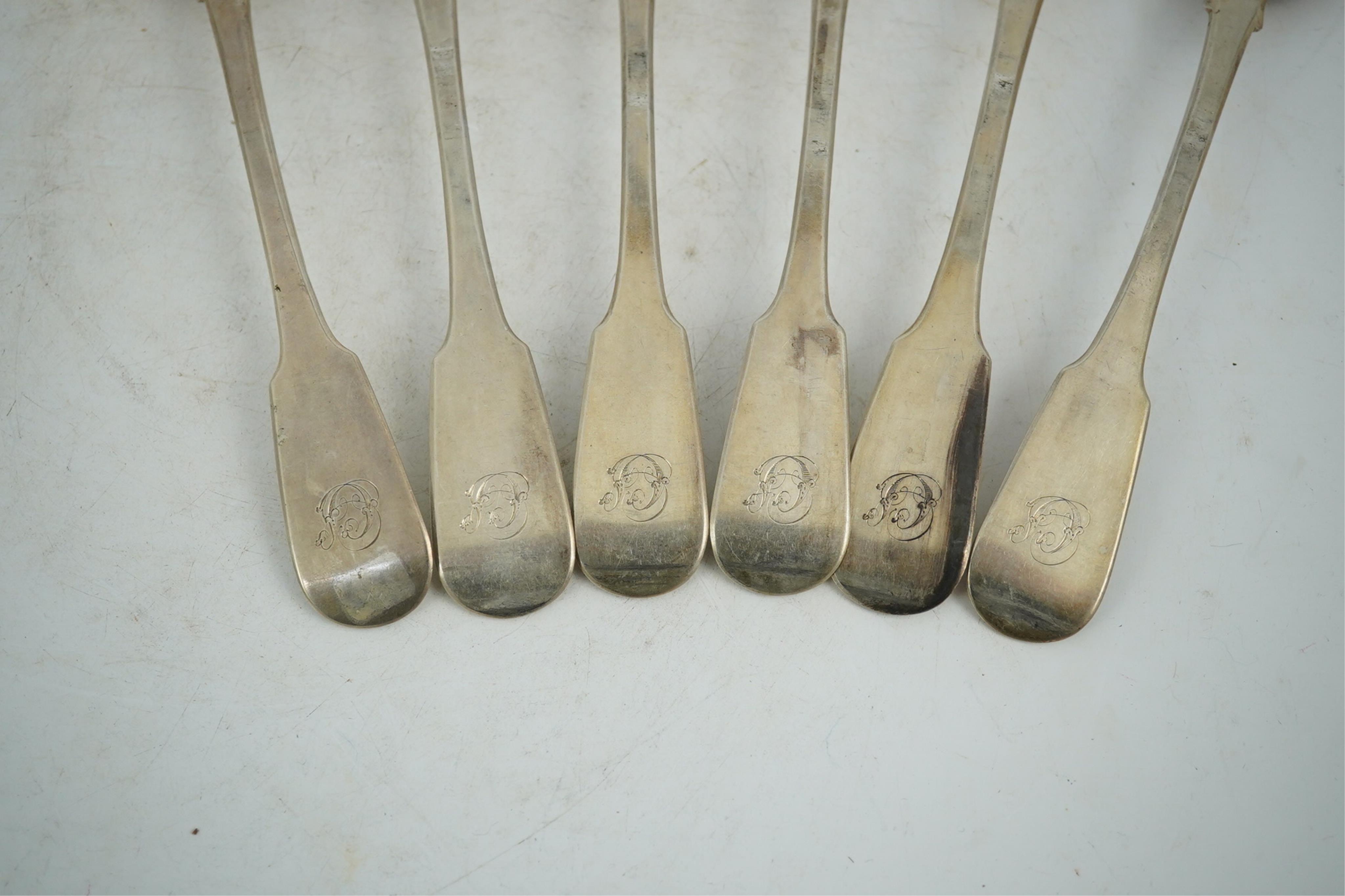 A set of six George IV Scottish silver fiddle pattern table spoons, Andrew Wilkie, Edinburgh, 1825, 13.2oz.